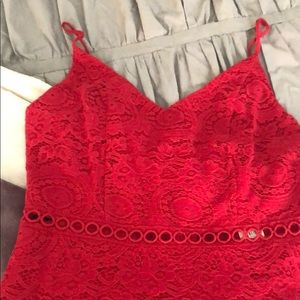 Francesca’s red ruffled dress